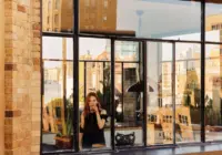 Julianne Moore Trades Her West Village Town House for a Serene, Light-Filled Duplex Atop a 1920s Building